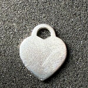 Tiffany &  Co heart charm. Sterling silver